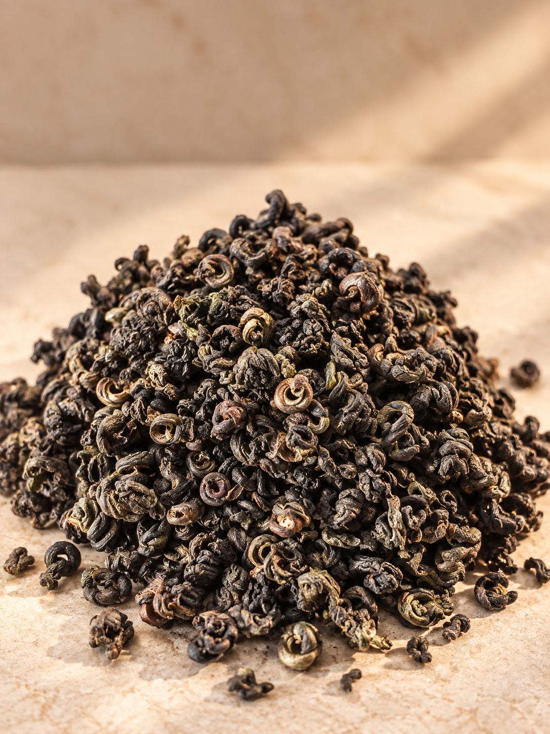 Dried shelled Isam periwinkle meat arranged on a warm CaMasi Maison editorial background.